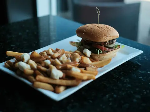 Burger served with poutine